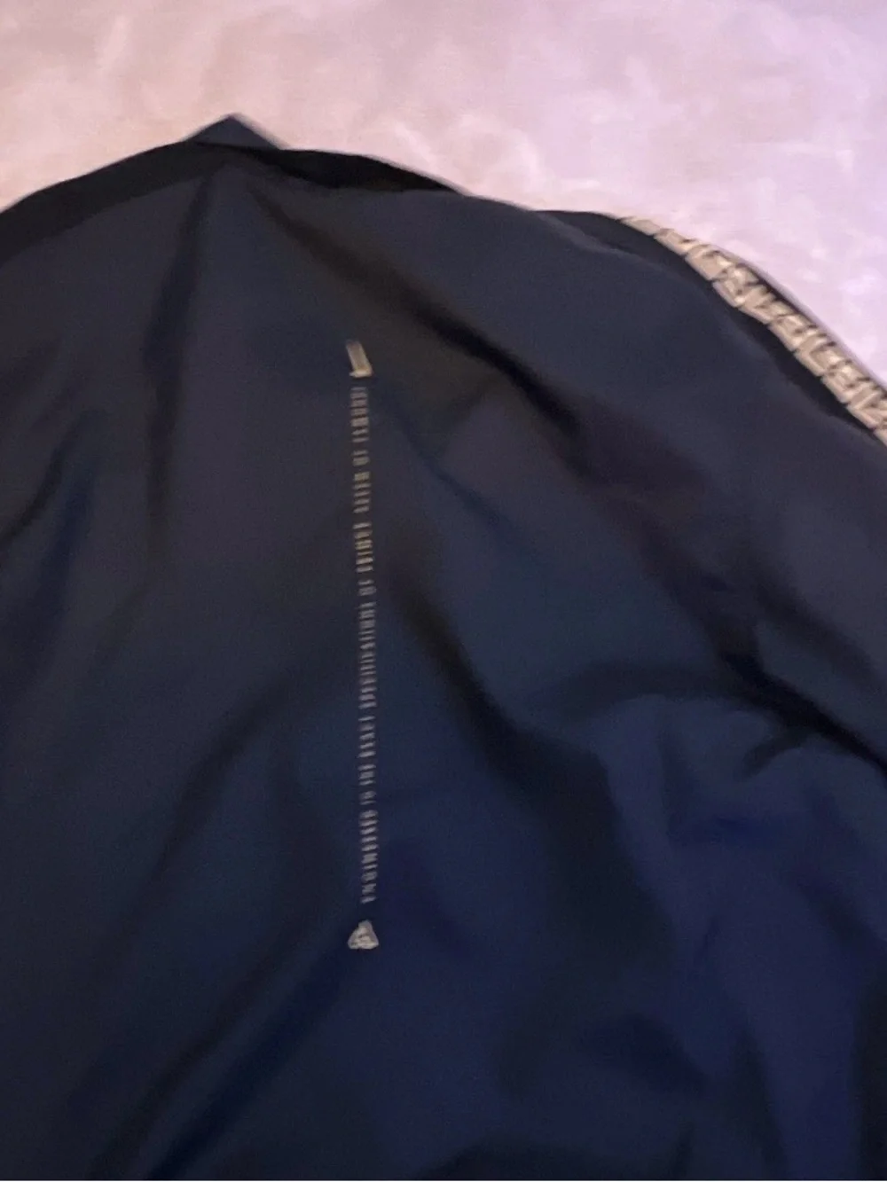 Nike Black Windbreaker Jacket with Gold Sleeve Tape